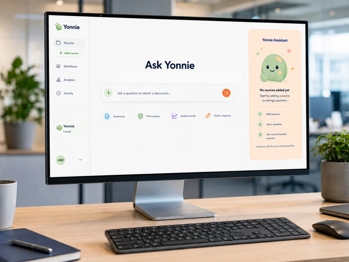 Yonnie private AI interface on a small business desk computer with an Ask Yonnie prompt