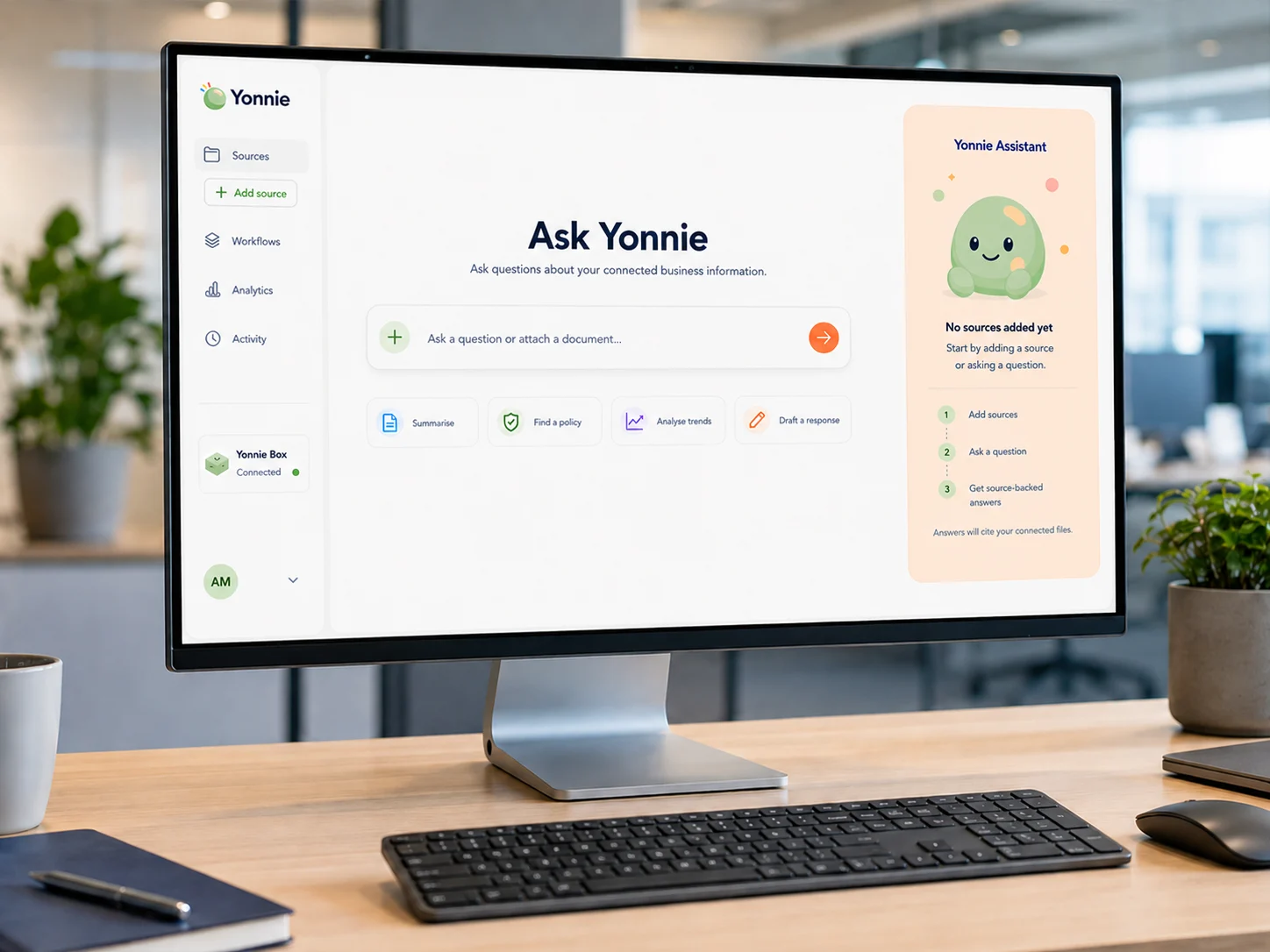 A small business office computer showing the Yonnie private AI interface